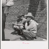 Farmers on street corner. Odessa, Texas