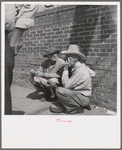 Farmers on street corner. Odessa, Texas