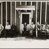 Resettlement workers in front of camp building, Black River Falls Land Use Project, Wisconsin