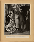 Under portraits of Hollywood Stars, younsters [sic] swing modified versions of Harlem's hottest. Wedge shoes are a fashionable note