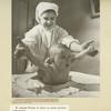 Nurse with a six month old baby at State Pediatric Medical Institute in Leningrad