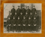New York City fire fighter Wesley A. Williams (second row, far right) in group portrait with other fire fighters after his appointment to the New York City Fire Department