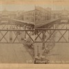 Elevated railroad tracks and station