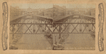 Elevated railroad tracks and station