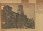 Row of buildings on the south side of Thirty-fourth Street, between Seventh and Eighth Avenues, that is being razed to make way for the approach to the Pennsylvania Terminal--note the men demolishing the tower of the church