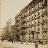 Tenement row; Long Acre Storage; Children playing ball in street