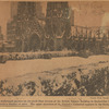 The landscaped gardens on the sixth floor terrace of the British Empire Building in Rockefeller Center, covered with a blanket of snow. The upper structure of St. Patrick's Cathedral appears in the background