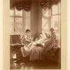Three girls with photograph albums
