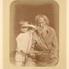 Charity: man and boy begging