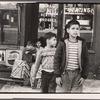 Children near plumbers' shop, New York City