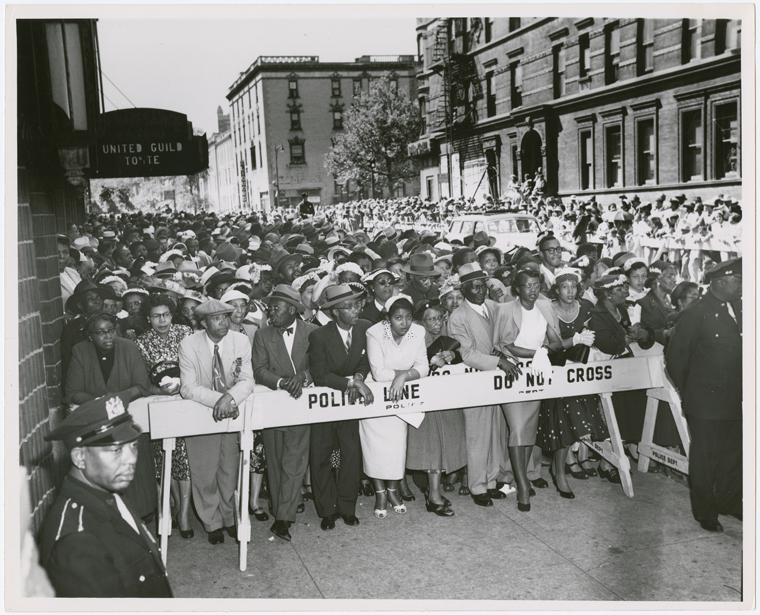 Crowds gathered outside Abyssinian Baptist Church, in Harlem, New York, during visit of Emperor Haile Selassie I of Ethiopia, 1954.