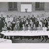 Group portrait of church leaders of the Abyssinian Baptist Church, Harlem, New York, with Pastor Rev. Adam Clayton Powell, Jr. (seated, third from left), his son, Adam Clayton Powell III (standing) and Adam Clayton Powell, Sr. (seated forth from left), circa 1950.
