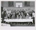 Group portrait of church leaders of the Abyssinian Baptist Church, Harlem, New York, with Pastor Rev. Adam Clayton Powell, Jr. (seated, third from left), his son, Adam Clayton Powell III (standing) and Adam Clayton Powell, Sr. (seated forth from left), circa 1950.