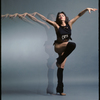 Cynthia Onrubia performing dance step from stage production Cats in studio (leg up, multi-exposure)