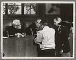 Spencer Tracy (left), Richard Widmark (right), and Stanley Kramer, (back). Judgement at Nuremberg movie set.