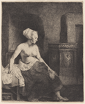 Woman sitting half dressed beside a stove
