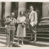 Gret Palucca and Artur Michel with unidentified man on the steps of a public building in Berlin