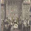 The Queen on the throne receiving the speech from the Lord Chancellor.