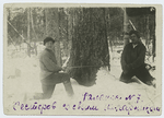 Sesterov with his collegue, sawing tree