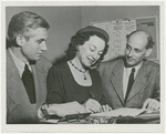 Oliver Smith and Rudolf Bing with Lucia Chase signing a contract with Metropolitan Opera