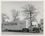 A man in casual dress standing in front of a Ballet Theatre truck