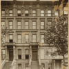Brownstones; child and man outside
