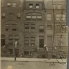 Brownstones, Romanesque Revival style, woman & child on stoop
