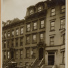 Brownstones and brick row house; Stanley Steamer automobile (?)