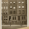 Row houses; child outside