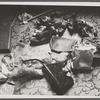 Still life: shoes, bags, etc. on damask (Paris or London).