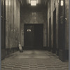 Office building lobby with broom & elevator
