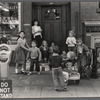 Group of children playing in a doorway