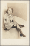 Portrait, seated child