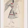 Shirtwaist dress with contrast Peter Pan collar and leather straps on cummerbund and skirt; brass buckles on straps