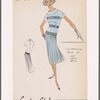 Contrasting trim on one-piece dress; dropped waist and accordion-pleated skirt; roll cuffs on short sleeves; back zip closure