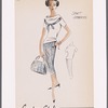 Tweed straight skirt with buttoned and pointed pocket flap, paired with cowl-neckline overblouse trimmed with matching buttoned and pointed tweed bow