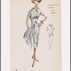 Herringbone tweed short-sleeved dress with jewel neckline and decorative arrowhead button tabs on front; pleats at bodice-skirt seam for fullness; matching sleeveless jacket