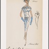 Short-sleeved drop-waist print dress with bow and gathers at right hip; decorative straps at neck and layered on collar