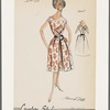 Sleeveless print dress with asymmetric bateau neckline and full box-pleated skirt; V back with button closure and fringed tab; tab and fringe repeated at midriff; diamond-shaped back cutout