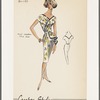 Shantung print dress with surplice neckline, belted waist and gathered fabric at left hip; satin trim along neckline and hip piece; soft gathers on bodice and hip