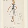 Short-sleeved dress with large flat collar with notches and deep lapels; wide belt with button detail above and below; large patch pockets on either side of inverted pleat; striped contrast dickey
