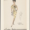 Print dress with lowered waistline and button panel on bodice
