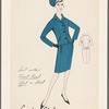 Suit with front panel effect on skirt