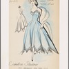 Open-back strapless evening dress has wide skirt with sharply-pointed godets, lace trim on bodice and hem.  