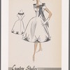 Short-sleeved cocktail dress with V neckline and contrast draped shoulder scarf; scallop effect at skirt hem with contrast lining visible