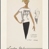 Short-sleeved crepe blouse with lace trim in bands front and back and on sleeves; gathered bodice and decorative waist bows