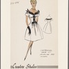 Dress with contrasting trim at neckline and closing