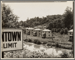Mining company houses along river. Masontown, West Virginia