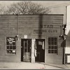 Shop fronts, laundry and barber shop. Vicksburg, Mississippi. Negro shop