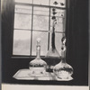 Still life: three glass bottles.